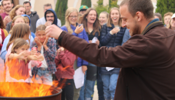 A student burns their draft