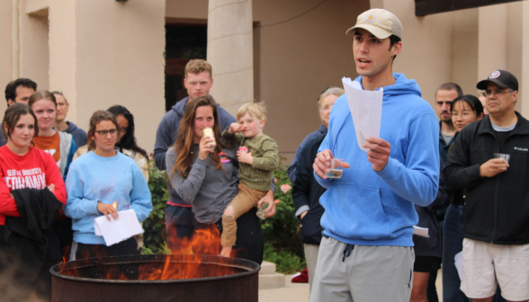 A student burns their draft