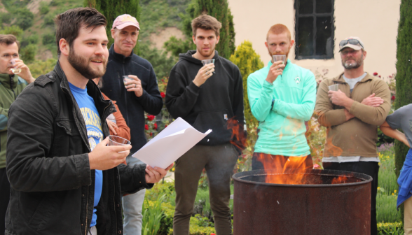 A student burns their draft