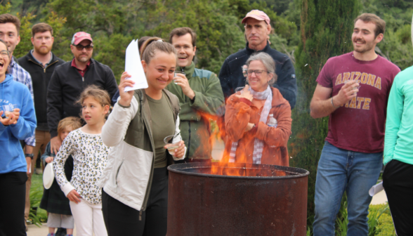 A student burns their draft