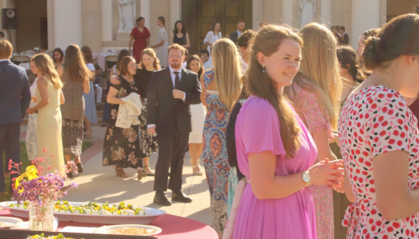 Students chatting in clusters on the quad