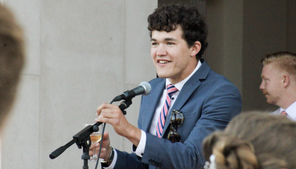 Another student gives a toast