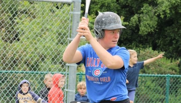 A student at the plate