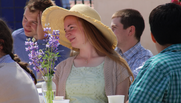 A student at one of the tables