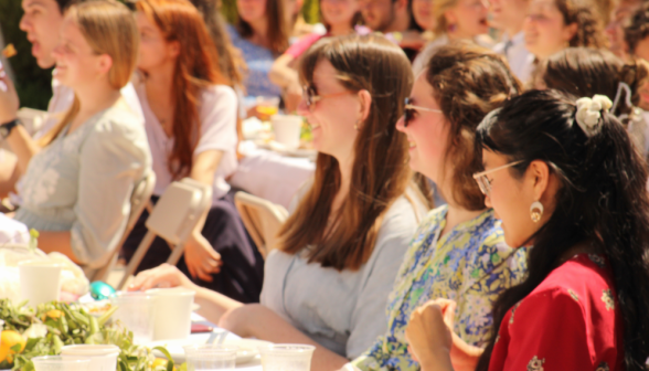 Students listen to the toast