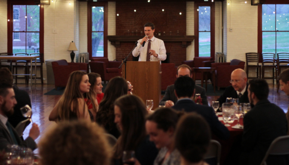 A student gives a toast