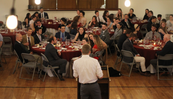 A student gives a toast