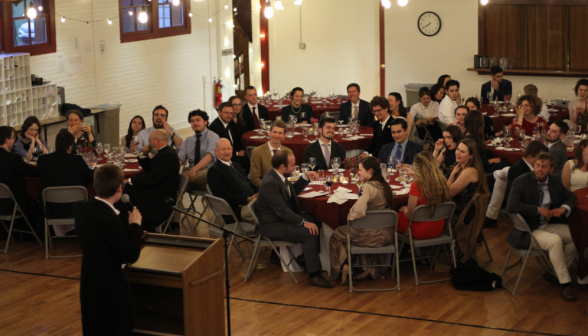 A student gives a toast