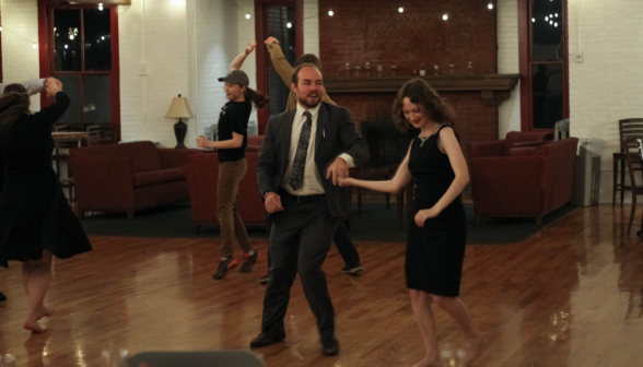 A student couple dances