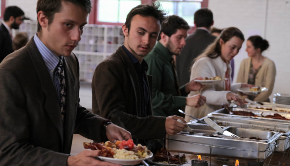 Students get food at the serving line