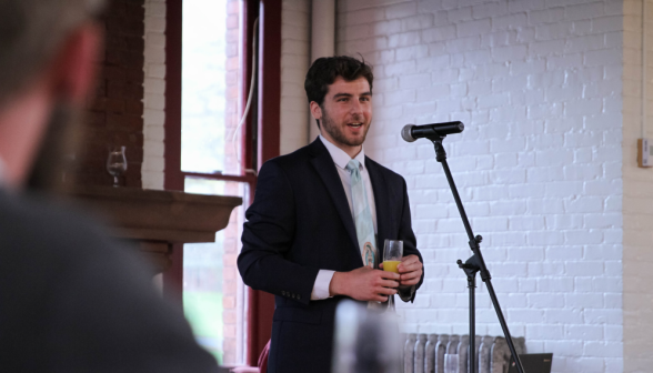 A student gives a toast