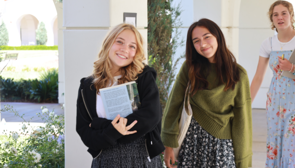 Students at art show on academic quadrangle