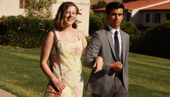 Gentlemen escort the ladies to the banquet