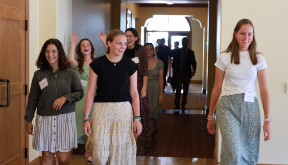 Students enter the classroom building