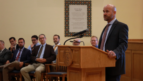 Brian Dragoo addresses the students