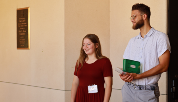 Two together outside the classroom building