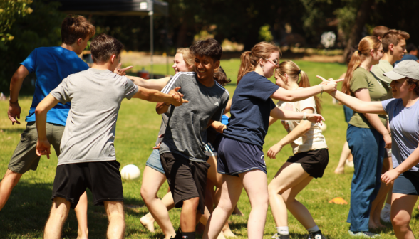 Pairs of students finger fencing