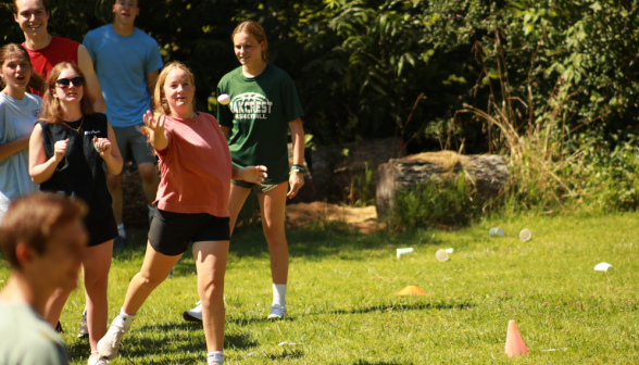 A student throws an egg