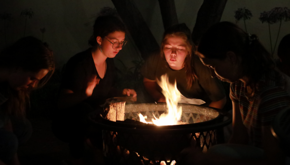 Three around a bonfire