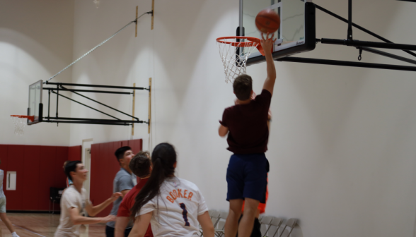 A student makes a layup