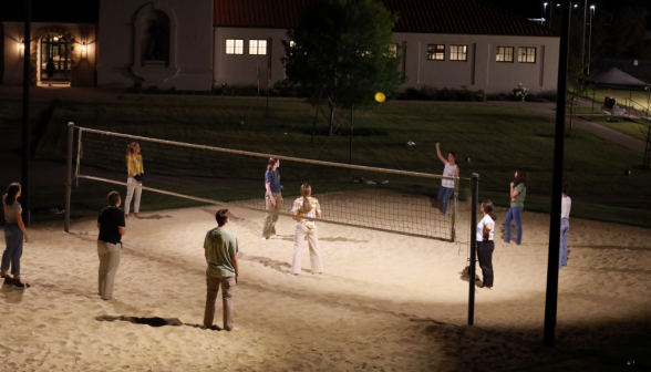 Students play volleyball