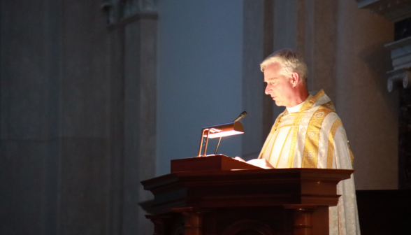 Fr. Walshe at the pulpit