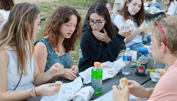 Students chat over subs