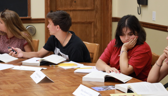 Students study at the table