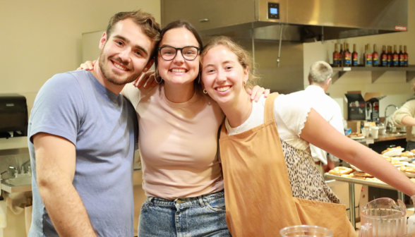 Three prefects pose in the coffee shop