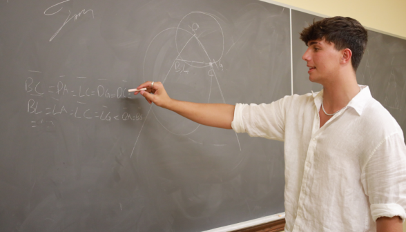 A student does a prop at the board