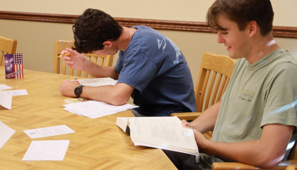 Two study at the table