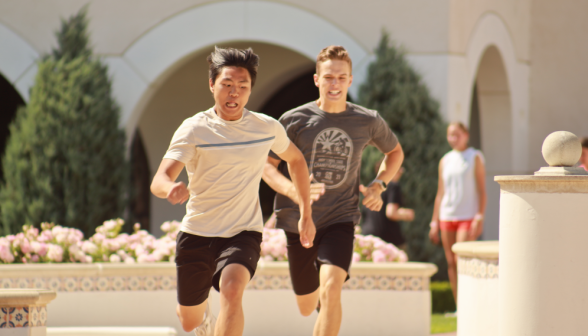 Two sprint past the Guadalupe fountain