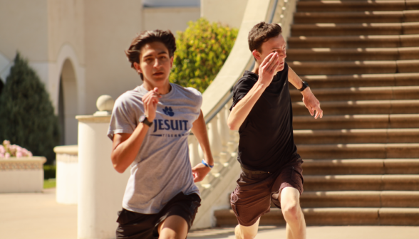 Two sprint past the stairway
