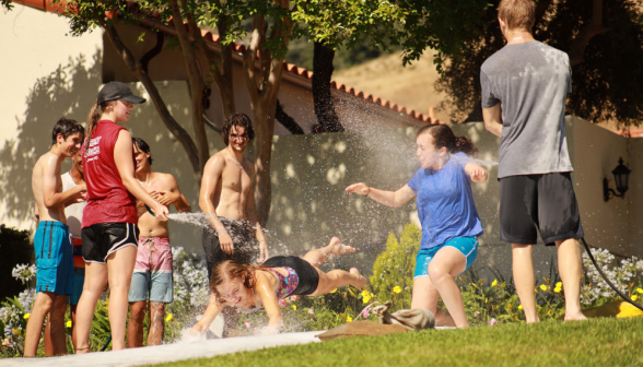 A student gets sprayed in the face