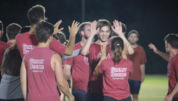 One team high-fives each other