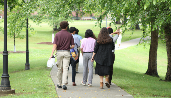 A group walks toward Gould