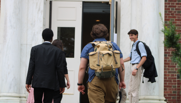 Students enter the classroom building