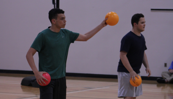 Two with dodgeballs in hand