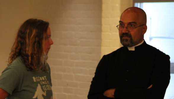 Fr. Viego chats with a student