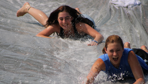 Two descend the waterslide