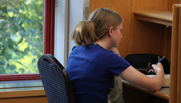 One studies at a desk