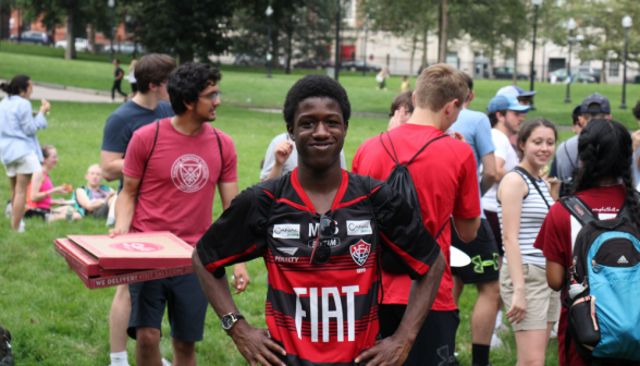 A student smiles for the camera