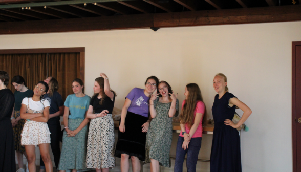 Students look on the from the women's side