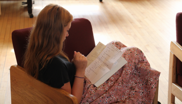 A student studies Euclid in the Commons