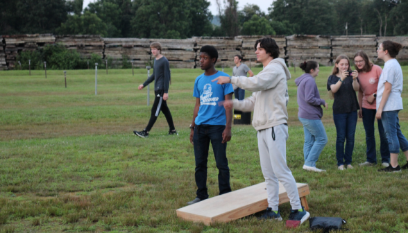 Students play beanbags