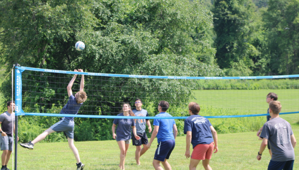 A student sends the ball over