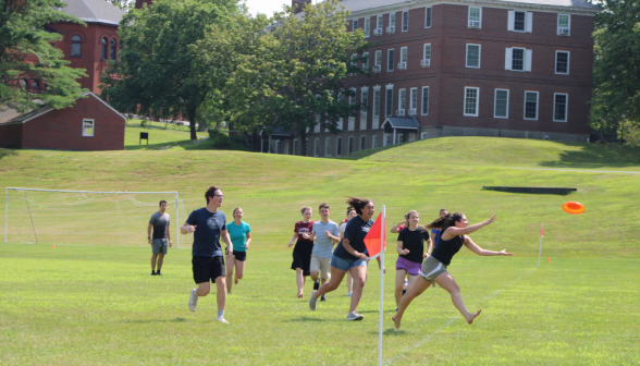 Students play volleyball