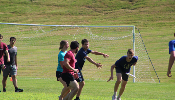 Students play Frisbee