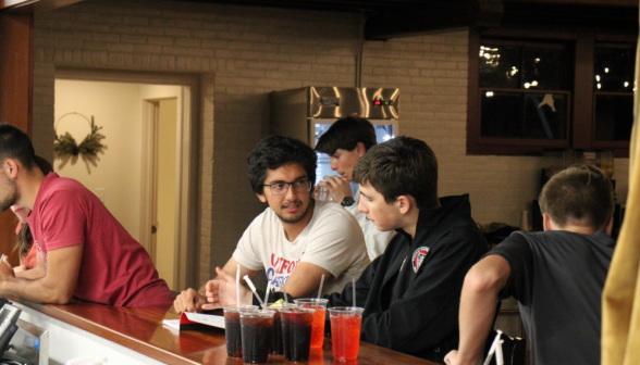 Student chat at the coffee shop counter