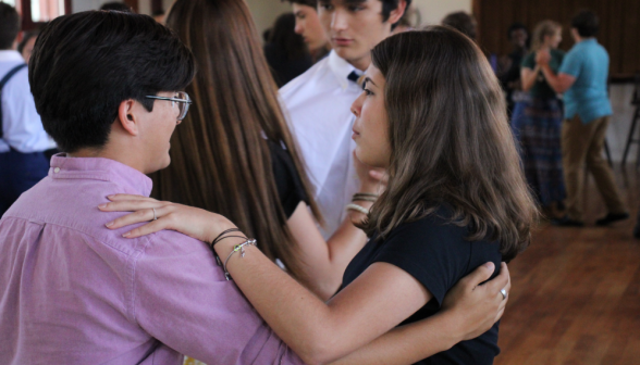 A student pair dances